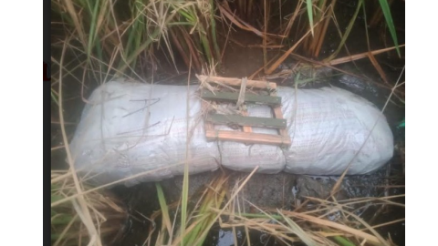 AK rifle anD magazine thrown by Pakstani drone recovered from fields by Border Security Forces